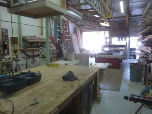 That king sized bed platform toward the right front of this view is the massive CNC router table.